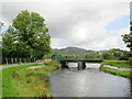 SH9335 : Bridge over river channel, Bala by Malc McDonald