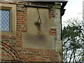 SE3084 : Sundial on former almshouses, Burneston  by Diocese of Leeds