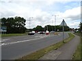 SP8479 : Rothwell Road (A4300) approaching roundabout by JThomas