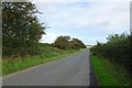 TA0773 : Road approaching crossroads north of Burton Fleming by DS Pugh