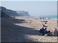 TG2042 : Relaxing at the seaside, Cromer Beach by Peter S