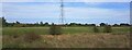 SE5309 : Pylon line along Old Ea Beck, from the railway by Christopher Hilton