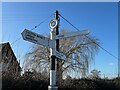 SK6935 : Finger post at Fernhill Farm by David Lally