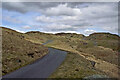 SN7768 : Moorland road to the Teifi Pools in Ceredigion by Roger  D Kidd