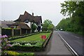 TQ3642 : Immaculate Lawn and London Temple Gatehouse by Glyn Baker