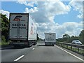 SP5877 : Caravans and lorries on the A14 trunk road by TCExplorer