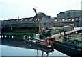 SJ6573 : Narrow boat 'Mendip' being loaded, River Weaver, Northwich (1) by Martin Tester