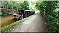 SE1739 : House boat on Leeds & Liverpool Canal in Buck Wood by Roger Templeman