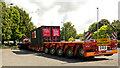 SS5533 : A heavy haulage vehicle negotiating a roundabout on Pilton Causeway by Roger A Smith