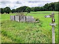 SK1256 : Fingerpost and ruined field barn by Ian Calderwood