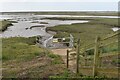 TF8544 : Sluice draining Overy Marshes into Overy Creek by David Martin