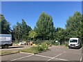 SX9389 : Car park and picnic table, by commercial units, Marsh Barton, Exeter by David Smith