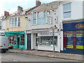 SX9265 : Betting shop, mosaic workshop, Mare and Foal sanctuary shop by David Hawgood