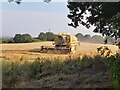 SK4144 : A combine harvester at work by Ian Calderwood