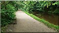 SE1238 : Leeds and Liverpool Canal heading east with Hirst Wood on the right by Roger Templeman