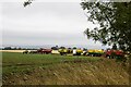 NO7054 : Pea viners at Dunninald, Angus by Adrian Diack