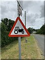 SH6572 : Farm vehicles in road warning sign, Abergwyngregyn by Meirion