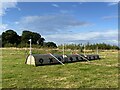 SJ8606 : EcoGreen OXO rolltops at Chillington Hall Horse Trials by Jonathan Hutchins