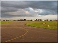 TL1220 : Runway access at London Luton Airport by M J Richardson