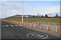 TL5623 : Orange bollards - orange car park by Mr Ignavy