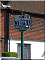 TR1134 : Lympne Village Sign by Oast House Archive