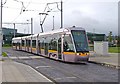 O0830 : Luas tram no. 3003 approaching Red Cow/An Bhó Dhearg tram stop by P L Chadwick