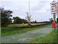 TM3979 : Broadway,Triple Plea Public House sign & Broadway Postbox by Geographer