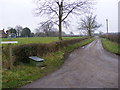 TM4065 : Footpath & entrance to Rubblestone & Boundary Farms by Geographer