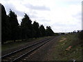 TM3758 : Railway Line to Wickham Market Railway Station by Geographer