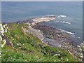 NZ9702 : Rocks below Old Peak, or South Cheek at low tide by Pauline E