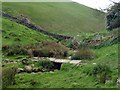 SK1056 : Footbridge below Wetton Hill by Graham Hogg