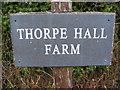 TM2855 : Thorpe Hall Farm sign by Geographer