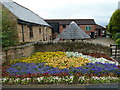 SK4081 : Ridgeway Craft Centre and spring floral display by Andrew Hill