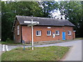 TM1868 : Bedingfield Village Hall & Roadsign by Geographer