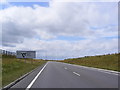 TL2762 : Approaching the Roundabout on the A1198 Papworth Everard Bypass by Geographer