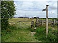 SE0739 : Footpath sign and gap stile by Christine Johnstone