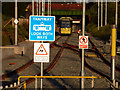 SJ8293 : Signs at the south east end of St Werburgh's Road Metrolink station, Chorlton by Phil Champion