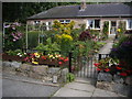 NJ6201 : A front garden in Inchley Place by Stanley Howe