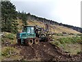 NM4948 : Forest forwarder near Lettermore by Oliver Dixon