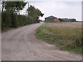 SK8370 : Farm Buildings on track from Moor Lane by J.Hannan-Briggs