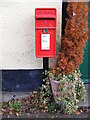 TM1877 : Post Office Low Street Postbox by Geographer