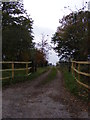 TM1872 : Footpath to The Street, Denham Street & entrance to Grove & Barn Cottages by Geographer