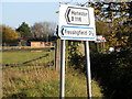 TM2773 : Roadsign at the B1116 junction by Geographer