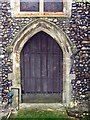 TL7325 : St Mary, Panfield - West door by John Salmon