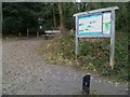 TQ0349 : Seat and information board in car park on Guildford Lane by Shazz