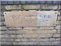 TQ4383 : Plaque on the Flood Defence Wall by Geographer