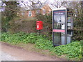 TM4881 : Telephone Box & Main Road Postbox by Geographer