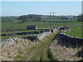 SK1467 : Hutmoor Butts (track) towards barn and track junction by Andrew Hill