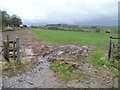 NZ1160 : Muddy field entrance by Christine Johnstone