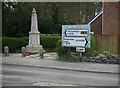 SX4499 : Signs and War Memorial at Halwill Junction by roger geach